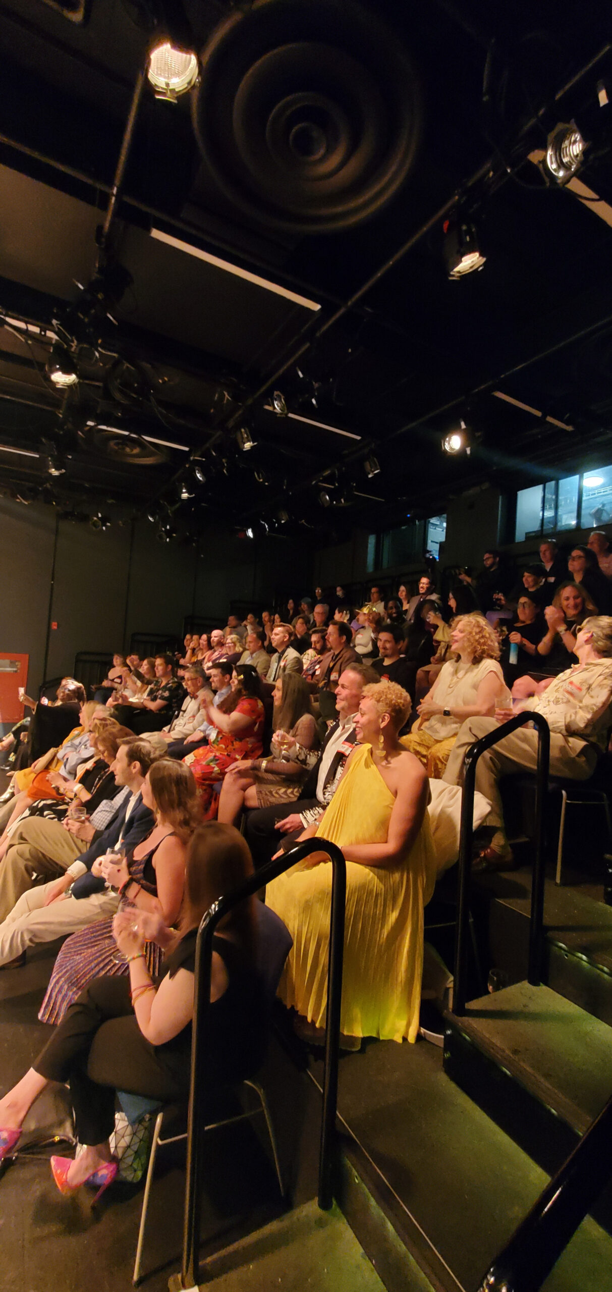 Audience seated in theatre